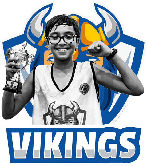 vikings basketball player raising a trophy